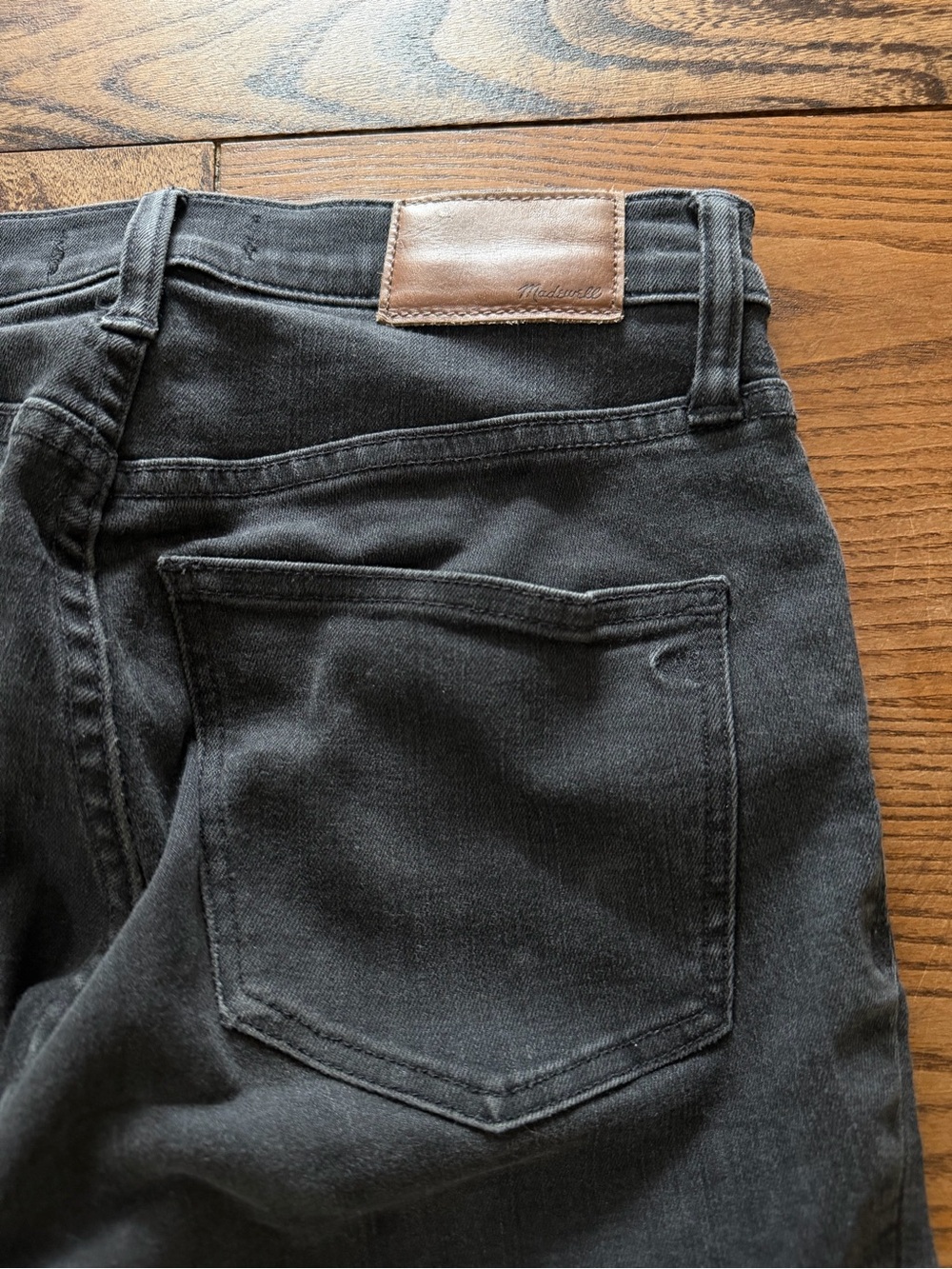 Madewell Black Skinny Jeans with Brown Leather Patch
